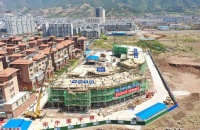 云南省最大易地扶贫搬迁安置点配套幼儿园顺利封顶