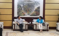 西双版纳景洪市领导赴卓正控股集团就康养旅居产业合作召开座谈会