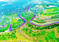 人字形臂弯“拥并入怀” 229.5公里东西山旅游公路相连