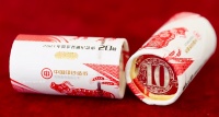雅而尚礼、文不失秀的《牛运同福》卷筒装贺岁牛流通币