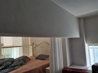 业主收房时发现多出一根大横梁，进房间得弯着腰？法院判开发商补偿房款！