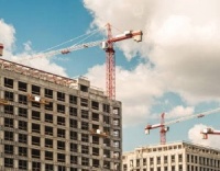 A股房企三季报显平淡，万科、保利发展等头部房企第三季度净利收缩