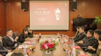 以牌会友!业之峰与五粮液举行企业交流会