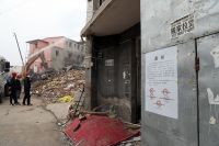 北京广渠路南侧拆除27栋出租公寓 群租人数过万