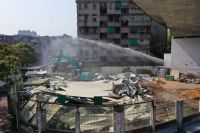 【扮靓内海湾迈进亚青会】金凤路桥下3500平方米区域集中拆违