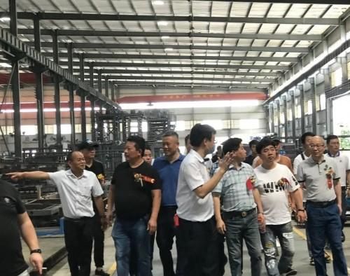浙江新墙材协会考察团莅临三联机械，共谋发展之路