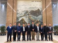 朱冬青秘书长率队调研走访中联慕尼、北新建材和东方雨虹