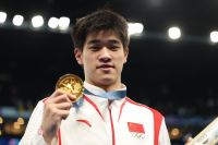 中国体育代表团荣耀加冕，潘展乐与奥普展现体育营销新态势